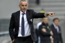Lazio coach Stefano Pioli gives instructions to his players during a Serie A soccer match between Sassuolo and Lazio at Reggio Emilia's Mapei stadium, Italy, Sunday, March 1, 2015. (AP Photo/Marco Vasini)