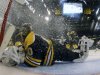 Boston Bruins goalie Tuukka Rask (40), of Finland, defends the net as ice crystals swirl around him during the second period in Game 3 of the NHL hockey Stanley Cup Finals against the Chicago Blackhawks in Boston, Monday, June 17, 2013. (AP Photo/Bruce Bennett, Pool)