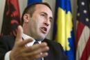 FILE - In this file photo dated Tuesday, April 22, 2008, Kosovo's former prime minister Ramush Haradinaj gestures during an interview with The Associated Press in Kosovo's capital Pristina. Kosovo's foreign ministry said in a statement Wednesday Jan. 4, 2017, that French police have detained Haradinaj based on an arrest warrant issued by Serbia. (AP Photo/Visar Kryeziu, FILE)
