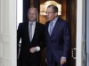 Sergei Lavrov and William Hague enter a hall during their meeting in Moscow