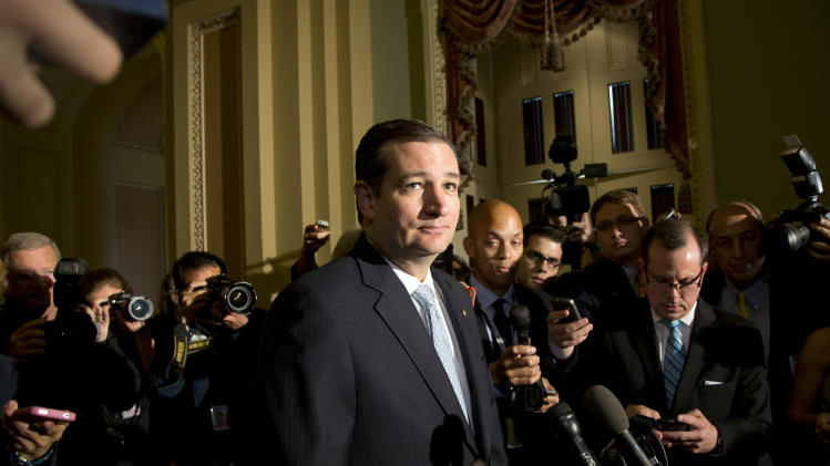 FILE - In this Oct. 16, 2013 file photo, Sen. Ted Cruz, R-Texas, speaks with reporters on Capitol Hill in Washington and said Republicans lost the government shutdown budget battle because some members of his own party in Congress turned on their colleagues. The bigger worry for many GOP party leaders is the growing rift between business-oriented Republicans and the GOP's more ideological wing. Each accuses the other of bungling the debt ceiling and government shutdown dramas, widely seen as a major Republican embarrassment. (AP Photo/Carolyn Kaster, File)