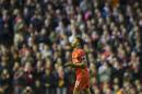 Liverpool's Raheem Sterling applauds supporters after being substituted during his team's English Premier League soccer match between Liverpool and Newcastle at Anfield Stadium, Liverpool, England, Monday, April 13, 2015. (AP Photo/Jon Super)