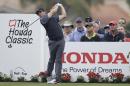 Rory McIlroy hits from the 16th tee during the second round of the Honda Classic golf tournament, Friday, Feb. 27, 2015 in Palm Beach Gardens, Fla. (AP Photo/Luis M. Alvarez)