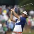 Bubba Watson of the U.S. watches his shot from the first fairway during the second round of the 2013 U.S. Open golf championship at the Merion Golf Club in Ardmore