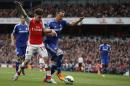 Arsenal's defender Hector Bellerin (L) vies with Chelsea's defender John Terry during the English Premier League football match at the Emirates Stadium in London on April 26, 2015