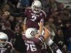 Texas A&M quarterback Johnny Manziel (2) gets a lift from Luke Joeckel (76) after running 18-yards for a touchdown during the third quarter of an NCAA college football game against Missouri, Saturday, Nov. 24, 2012, in College Station, Texas. (AP Photo/Dave Einsel)