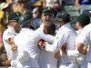 South Africa's Smith celebrates wicket of Australia's Wade during fourth day's play of third test cricket match in Perth