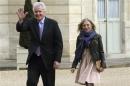 General Electric Chairman and CEO Jeffrey Immelt and Clara Gaymard, the head of GE France, arrive for a meeting to discuss the future of French engineering group Alstom at the Elysee Palace in Paris