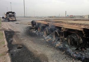 Burnt-out lorries are seen littering the side of the&nbsp;&hellip;