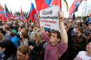 Participants attend rally supporting the pro-Russian people living in Ukraine's eastern regions, and the self-proclaimed People's Republics of Donbass and Luhansk, in Moscow