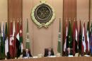 Foreign ministers of the Arab League take part in an emergency meeting at the League's headquarters in Cairo