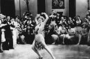 FILE - In this 1928 file photo, Actress Joan Crawford is seen dancing the Charleston in "Our Dancing Daughters" in Hollywood, Calif. A report released, September, 10, 2013, shows that the very wealthiest Americans earned more than 19 percent of the country's household income in 2012, their biggest share since 1928. And the top 10 percent captured a record 48.2 percent of total earnings last year. (AP Photo/File)
