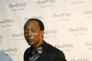 South African mining magnate Motsepe jokes as he walks down the red carpet at the opening of Kerzner's One and Only hotel in Cape Town