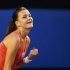 Agnieszka Radwanska of Poland celebrates defeating Ana Ivanovic of Serbia during their women's singles match at the Australian Open tennis tournament in Melbourne