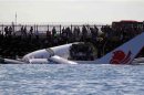 The wreckage of a Lion Air Boeing 737 -800 airplane is seen in the water near Ngurah Rai airport in Denpasar