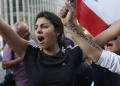 Lebanese prime minister quits amid anti-government protests