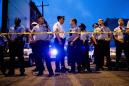 Gunman surrenders after 'volatile' hourslong standoff in Philadelphia; 6 officers shot