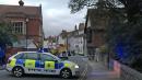 Roads shut after 2 fall ill in UK city where ex-spy poisoned