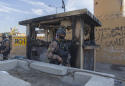 Militiamen withdraw from US Embassy but Iraq tensions linger