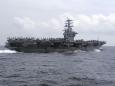 US Navy fires warning shot near Iranian vessels, Iranian state news agency says