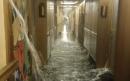 Passengers compare scene inside Caribbean cruise ship to the Titanic after 50 rooms were flooded 