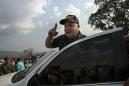 The Latest: Venezuela partially closes Colombian border