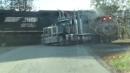 Caught on video: Truck driver escapes semi before it's hit by a train