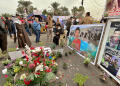 Baghdad mob kills teen gunman and strings up his corpse