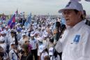 Tuk-tuks and flags as Cambodia opposition eyes bellwether local polls