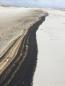 Oil washes up along five-mile stretch of Florida beach in wake of Hurricane Sally