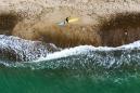 'Cold Hawaii': Danish coast surfs on virus wave
