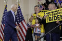 The Latest: Biden accuses Trump of abusing powers
