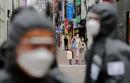 South Korea advises facilities suspension, experts warn of 'long battle' against coronavirus