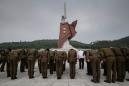 North Korea marks war anniversary as US remains flown out