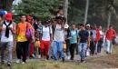 Hondurans defy Trump to head north for US border