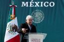 Mexican president vows justice in visit to town scarred by massacre