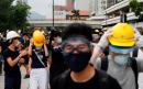 Police clashes as Hong Kong protest sweeps into neighbourhood popular with Chinese shoppers