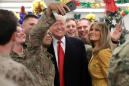Trump visits U.S. troops in Iraq, his first trip as president to a combat zone
