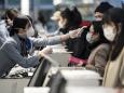 Virus Surge in Japan Risks Undoing Abe's Efforts to Woo China