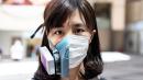 Hong Kong: City of two masks faces a new crisis