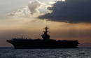 US warship captain seeks crew isolation as virus spreads