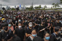 Protesters demand that embattled Hong Kong leader resign