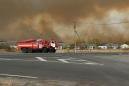 Russia evacuates villages as huge blaze breaks out at arms depot