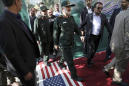 Iran unveils anti-American murals at former US Embassy
