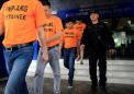 Philippine police arrest 43 foreigners for kidnap of Singapore woman