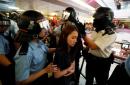 Hong Kong police break up scattered clashes between rival protesters