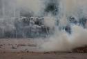 Nepal police fire tear gas to stop religious rally amid COVID-19 surge