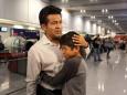 Donald Trump's immigration crackdown encapsulated in poignant images of father being deported