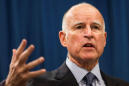 California revised budget up slightly, reinstates some cuts