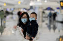 China seals off more cities as virus toll climbs